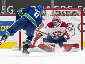 Canadiens goalie Carey Price makes save on the Canucks' Brock Boeser during shootout Monday night in Vancouver. The Canadiens lost the game 2-1.