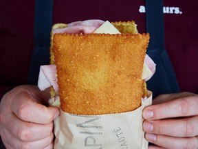 A giant gnocchi fritti sandwich from Little Italy's Mon Lapin, perfect for comfort food.