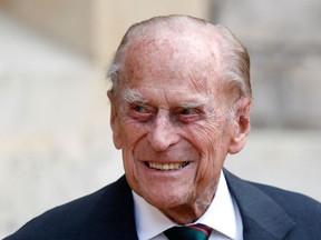 (FILES) In this file photo taken on July 22, 2020 Britain's Prince Philip, Duke of Edinburgh takes part in the transfer of the Colonel-in-Chief of The Rifles at Windsor castle in Windsor. - Queen Elizabeth II's 99-year-old husband Prince Philip on March 1, 2021, left the private London hospital where he had spent nearly two weeks to have heart tests and treatment at another hospital, Buckingham Palace said. Royal officials said the Duke of Edinburgh, as he is formally known, was taken from King Edward VII's hospital to the state-run St Bartholomew's Hospital in the City of London.
