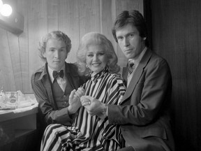 Then-Georgia Straight editor Bob Mercer (right) backstage at The Cave nightclub with Ginger Rogers and David Boswell, Sept. 26, 1978. David Boswell photo