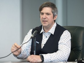 SEPB-Quebec executive director Pierrick Choiniere-Lapointe speaks during a news conference in Montreal, Sunday, March 7, 2021, where he spoke about the fact that employees at Laurentian Bank are claiming that the bank is trying to break up union representation at their branches.