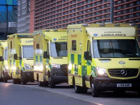 Ambulances are parked at the Royal London Hospital as the spread of the coronavirus disease (COVID-19) continues in London, Britain, January 1, 2021. REUTERS/Hannah McKay