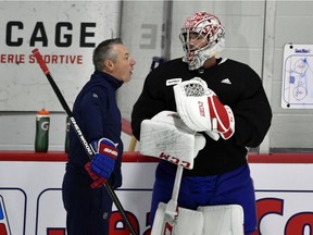 Montreal Canadiens goalie coach Stéphane Waite talks with Montreal Canadiens goalie Carey Price during a workout at the Bell Sports Complex in Brossard on July 21, 2020.
