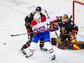 Montreal Canadiens right-wing Corey Perry scores a goal on Calgary Flames goaltender Jacob Markstrom during the third period at Scotiabank Saddledome in Calgary on March 11, 2021.