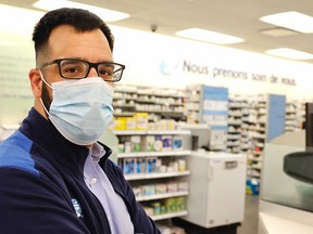 Matthieu Cecile, assistant manager of Pharmaprix on St-Denis St., waits to vaccinate up to 50 people per day.