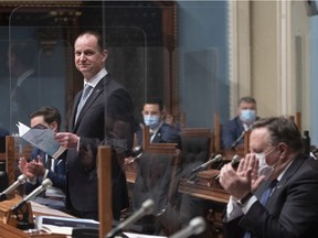 Quebec Finance Minister Eric Girard presents his budget in the legislature in Quebec City on Thursday, March 25, 2021.
