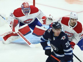 Canadiens goalie Carey Price tracks the puck during game against the Jets Monday night in Winnipeg.