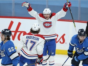 Montreal Canadiens forward Tyler Toffoli celebrates his game-tying goal late in the third period against the Winnipeg Jets with Josh Anderson in Winnipeg on March 17, 2021.