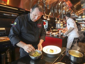 Chef Eric Gonzalez works in the kitchen at L'Atelier de Joël Robuchon at the Casino de Montréal in 2017.