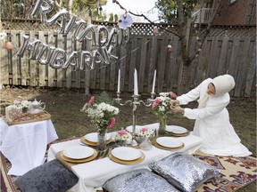 Asiyah Siddique prepares her backyard for Ramadan in Montreal on Sunday, April 11, 2021.