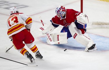 Jake Allen stop Calgary Flames Johnny Gaudreau on a breakaway during third period at the Bell Centre in Montreal on Wednesday, April 14, 2021.
