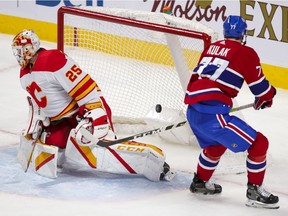 Montreal Canadiens defenceman Brett Kulak scores a goal against Calgary Flames' Jocob Markstrom during second period in Montreal on April 14, 2021.