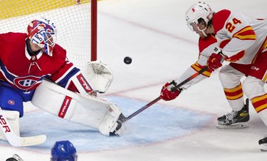 Brett Ritchie deflects the puck wide past Jake Allen during second period at the Bell Centre in Montreal on Wednesday April 14, 2021.