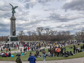 A few hundred people light gathered at the George-Etienne Cartier statue Mount Royal Park to celebrate 4-20 world pot smoking day in Montreal on Tuesday April 20, 2021.