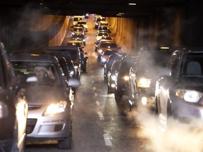 Traffic backs up through the Atwater Tunnel as a new construction configuration goes in to effect at the Highway 15 and Atwater Ave. exit, in Montreal, on Thursday, April 22, 2021.