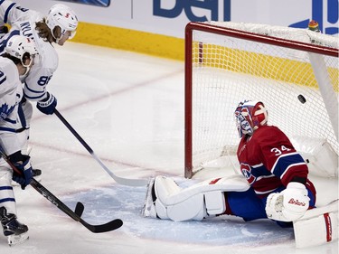 Toronto Maple Leafs centre William Nylander scores a power-play goal on Montreal Canadiens' goaltender Jake Allen during first-period action in Montreal on Wednesday, April 28, 2021.