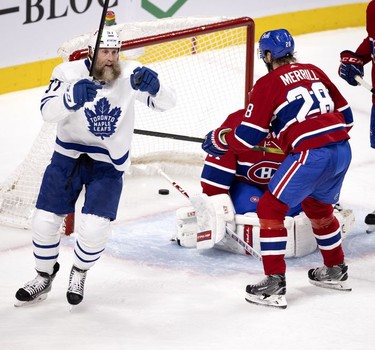 Toronto Maple Leafs centre Joe Thornton celebrates as the Leafs score on Habs goaltender Jake Allen during second-period action in Montreal on Wednesday, April 28, 2021.