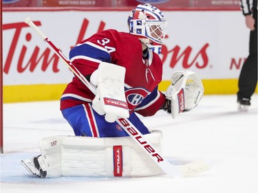 Jake Allen gets into a ready position during second period at the Bell Centre in Montreal on Thursday, April 8, 2021.