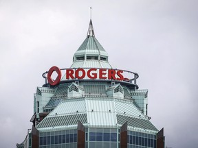 A sign is pictured on top of the Rogers Communications Inc. building in Toronto.