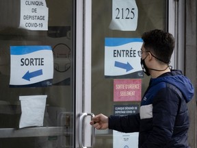 A man enters the COVID-19 testing site at Notre-Dame Hospital in Montreal on Tuesday, April 20, 2021.