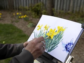 Shari Blaukopf works on a project as part of the upcoming Lakeshore Artists show. Blaukopf is seen in her backyard, in Beaconsfield on Friday, April 23, 2021.