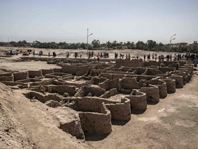 Archaeologists uncovered the remains of an ancient city in the desert outside Luxor that they say is the "largest" ever found in Egypt and dates back to a golden age of the pharaohs 3,000 years ago.