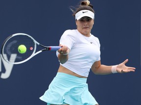 Bianca Andreescu of Canada hits a forehand against Ashleigh Barty of Australia (not pictured) in the women's singles final at the Miami Open at Hard Rock Stadium on April 3, 2021.