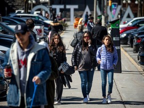 People were out and about in the ByWard Market with the lovely weather despite the first day of shutdown in Ontario Saturday, April 3, 2021. Some individuals wore masks while walking through the downtown core, but not all.