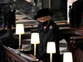 Britain's Queen Elizabeth is seen during the funeral of Britain's Prince Philip, who died at the age of 99, at St George's Chapel, in Windsor, Britain, April 17, 2021.