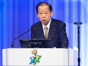 Japanese ruling Liberal Democratic Party (LDP) secretary general Toshihiro Nikai speaks during the annual party convention in Tokyo on March 21, 2021.