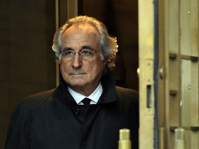 (FILES) In this file photo Bernard Madoff leaves US Federal Court after a hearing regarding his bail on January 14, 2009 in New York. - Bernie Madoff, the mastermind behind the worst financial scam in history, has died in prison at age 82, US media reported on April 14, 2021. Madoff was sentenced to 150 years in prison in 2009 for running a pyramid-style scheme that defrauded tens of thousands of people around the world. The scheme was estimated to be worth anywhere between $25 billion and $63 billion.