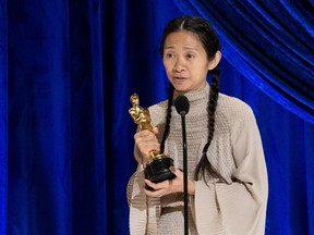 Chloe Zhao accepts the Oscar for Directing during the live ABC Telecast of The 93rd Oscars in Los Angeles on Sunday, April 25, 2021.