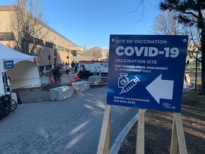 Dozens of people lined up outside the Bill Durnan Arena in Côte-des-Neiges April 8, 2021. The arena was quieter April 21, when the vaccine was offered to Montrealers over 45.