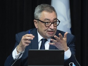 Quebec public health director Horacio Arruda speaks during a news conference on the COVID-19 pandemic, Wednesday, March 31, 2021 at the legislature in Quebec City.