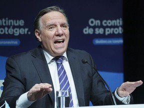 “The idea is to try to find a balance," Premier François Legault said Thursday of Quebec's evolving health measures. "When we lock down, it’s to protect people’s physical health; when we reopen, it’s to help their mental health.”