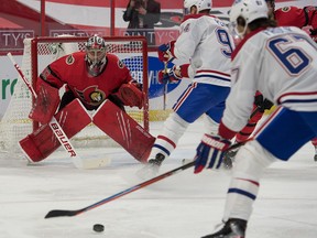Montreal Canadiens right wing Michael Frolik (67) shoots on Ottawa Senators goalie Filip Gustavsson (32) April 1, 2021.