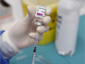 A nurse prepares to use AstraZeneca coronavirus disease (COVID-19) vaccine in Fasano Italy, April 13, 2021.