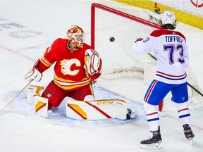 Canadiens winger Tyler Toffoli watches as captain Shea Weber's slapshot beats Flames goaltender Jacob Markstrom during first period Monday night in Calgary.