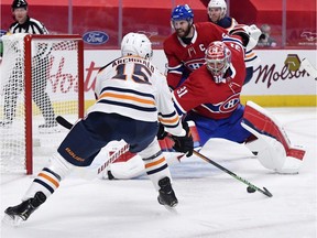 Montreal Canadiens goalie Carey Price stops Edmonton Oilers forward Josh Archibald during the second period at the Bell Centre in Montreal on on April 5, 2021.