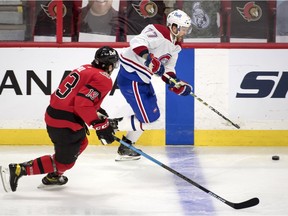 Senators goalie Filip Gustavsson squares up to stop a shot by Canadiens winger Michael Frolik during first period in Ottawa Thursday night.