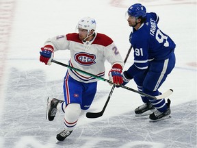 Montreal Canadiens forward Eric Staal (21) and Toronto Maple Leafs forward John Tavares (91) during the third period at Scotiabank Arena April 7, 2021.