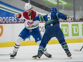 Vancouver Canucks forward J.T. Miller fights with Montreal Canadiens defenceman Ben Chiarot in the first period at Rogers Arena on March 10, 2021, Vancouver.