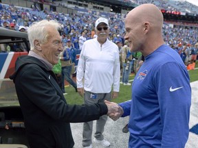 Former Buffalo Bills head coach Marv Levy, now 95, spoke to current head coach Sean McDermott, right, before an NFL game in 2019.