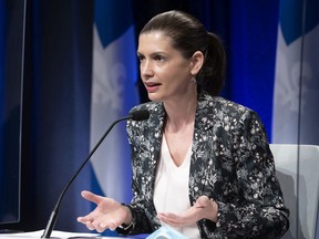 Quebec Deputy Premier and Public Security Minister Geneviève Guilbault speaks at a news conference to announce funding to organizations which provide help to violent intimate partners, in Quebec City, Thursday, April 29, 2021.