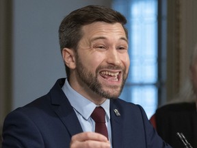 Gabriel Nadeau-Dubois, house leader of Québec solidaire, presented a motion deploring Sunday's vandalism but calling for a "healthy democratic debate" on public health measures, including the curfew.