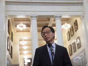 Sen. Yuen Pau Woo is shown in the foyer of the Senate in Ottawa in this file shot from pre-COVID times.