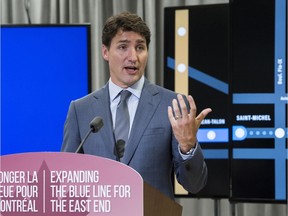 Prime Minister Justin Trudeau speaks during a news conference in Montreal, Thursday, July 4, 2019, where he announced a funding investment into the expansion of the Montreal métro blue line.