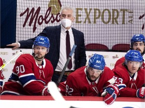 Montreal Canadiens head coach Dominique Ducharme with forwards Tomas Tatar (90), Jonathan Drouin (92), Tyler Toffoli (73) and Phillip Danault (24) during game against the Ottawa Senators in Montreal on March 2, 2021.