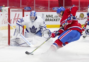Tyler Toffoli cuts to the net of Toronto Maple Leafs goalie Jack Campbell during first-period action in Montreal on Monday May 3, 2021.