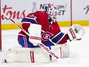 Montreal Canadiens' Jake Allen makes a trapper save during second period against the Toronto Maple Leafs in Montreal on May 3, 2021.